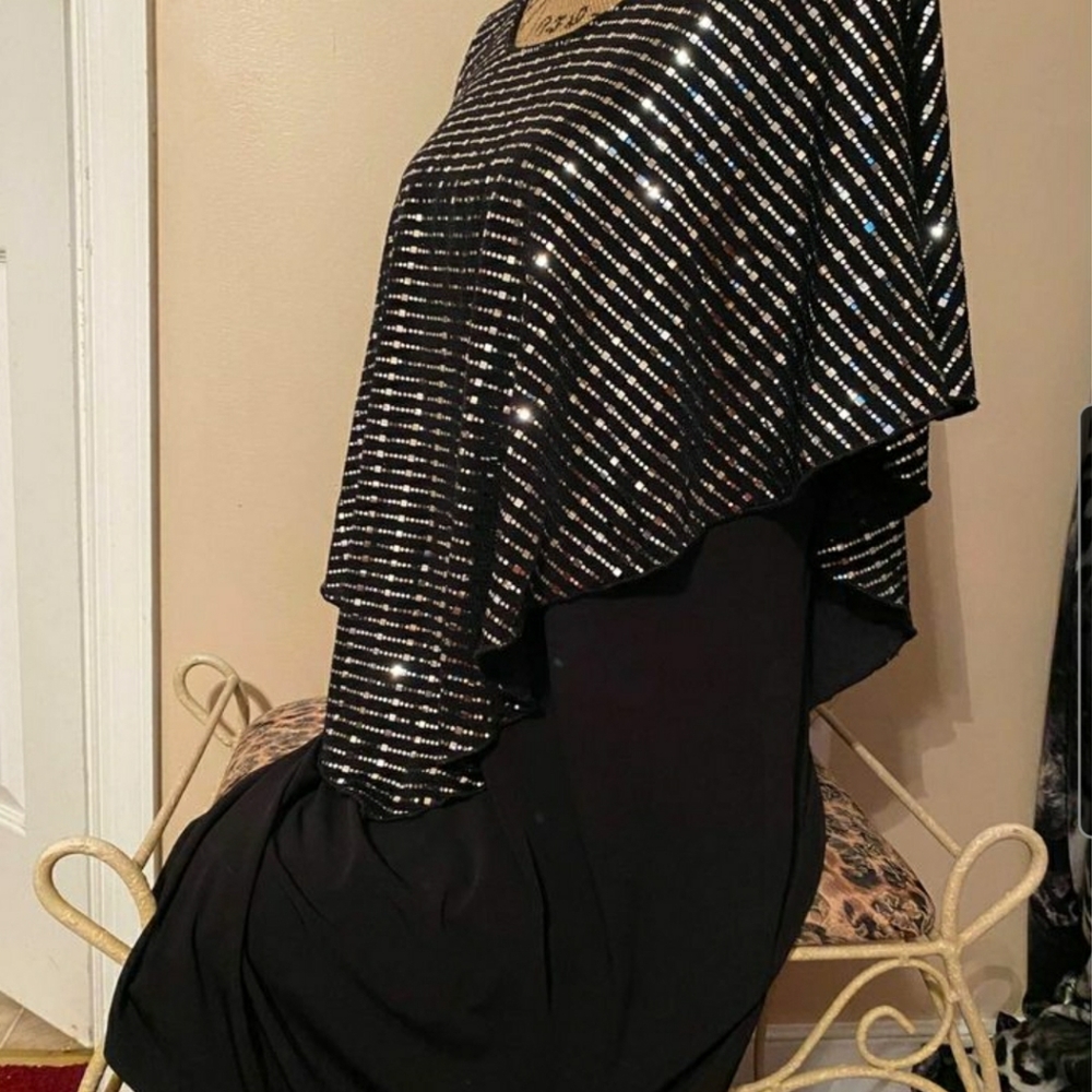 Knee length figure flattering black dress